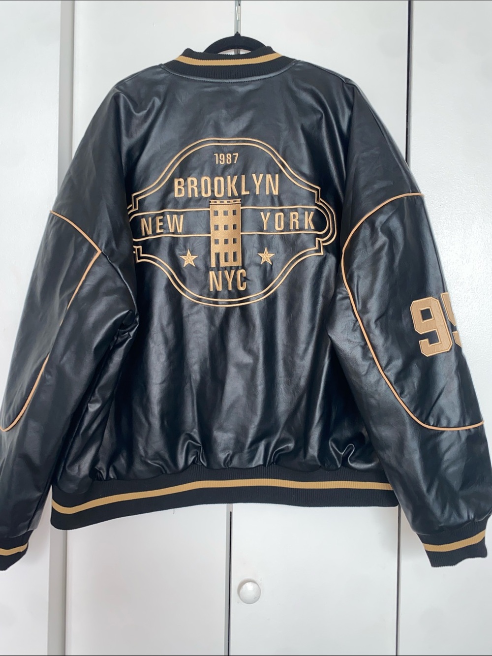 NWT Fashion Nova Black Varsity Faux Leather Jacket with Gold Trim - Picture 6 of 14